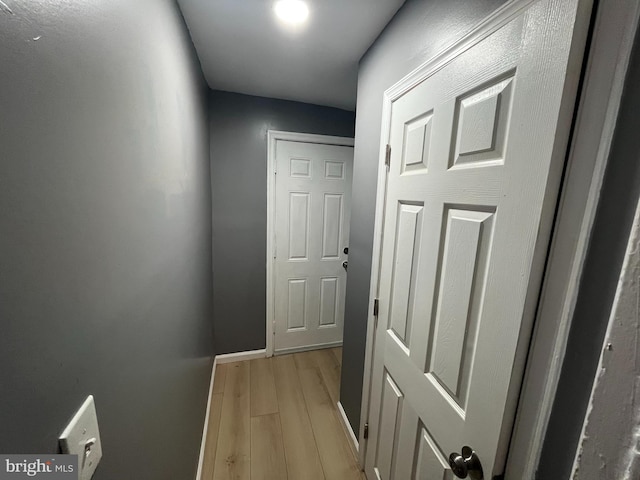 corridor featuring light hardwood / wood-style flooring