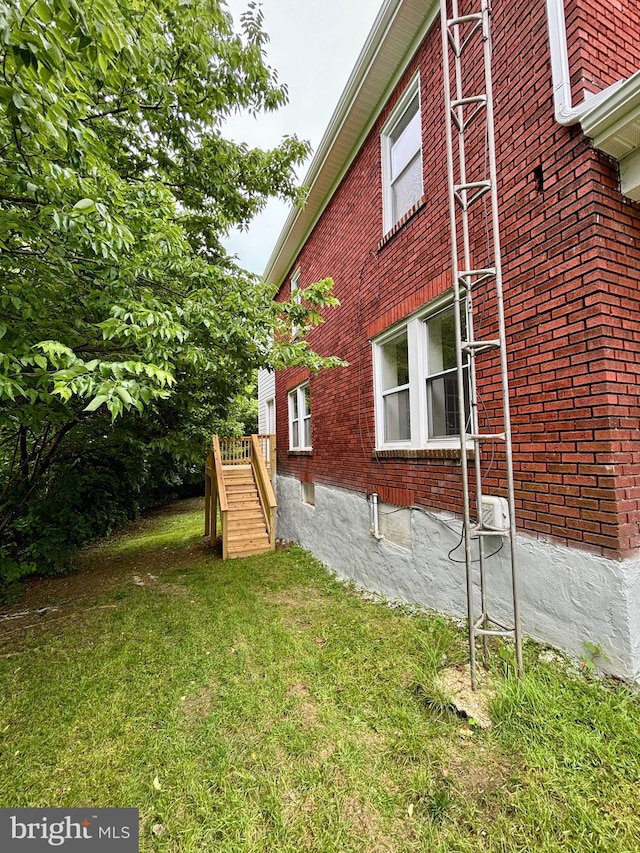 view of property exterior featuring a yard