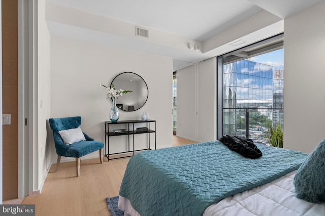 bedroom featuring light hardwood / wood-style flooring