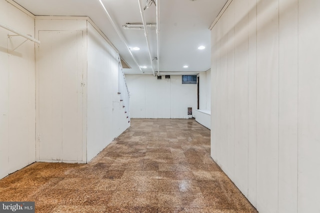 basement featuring tile flooring