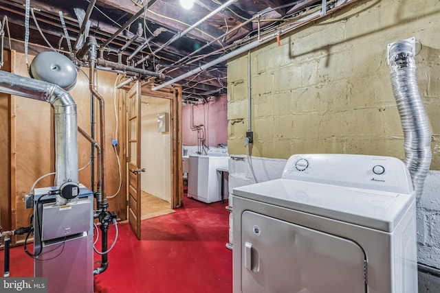 laundry room featuring washer and clothes dryer