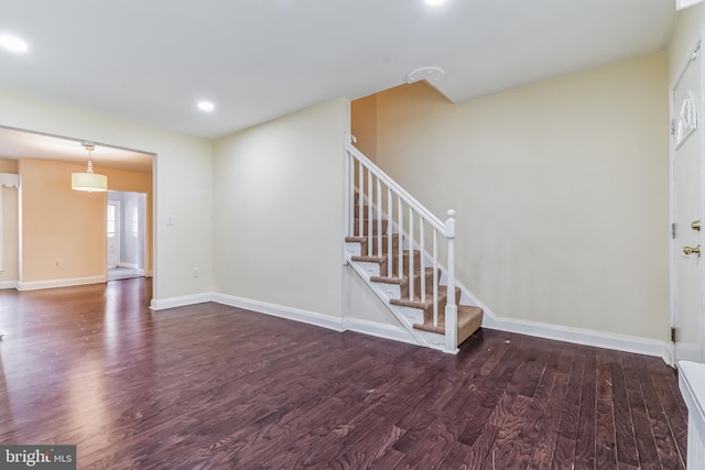 interior space with dark wood-type flooring