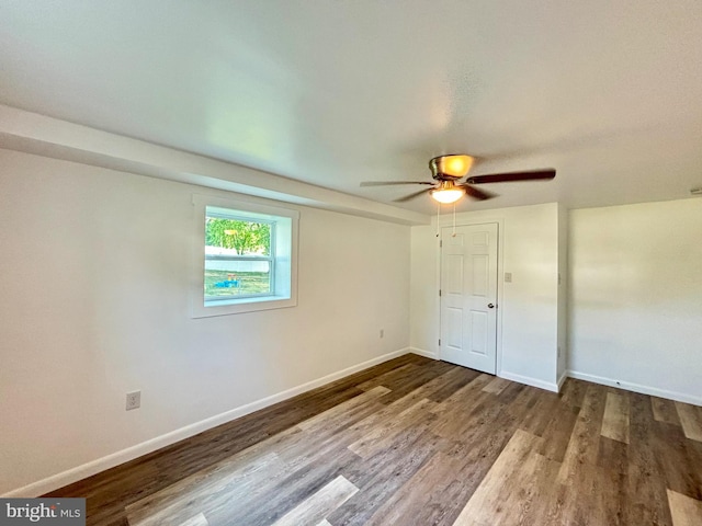 unfurnished bedroom with ceiling fan and hardwood / wood-style floors