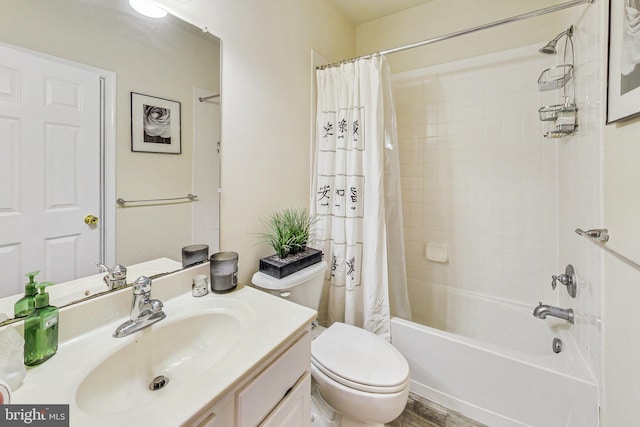 full bathroom featuring shower / bath combo with shower curtain, toilet, and vanity