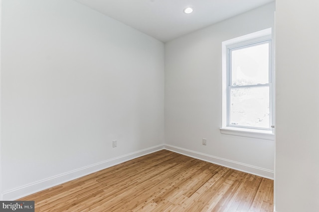 spare room with light wood-type flooring