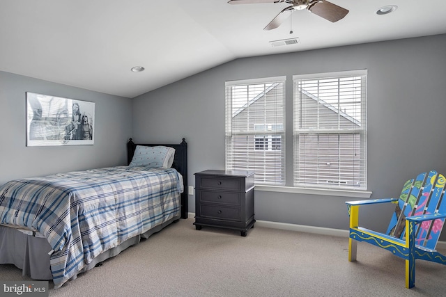 carpeted bedroom featuring lofted ceiling and ceiling fan