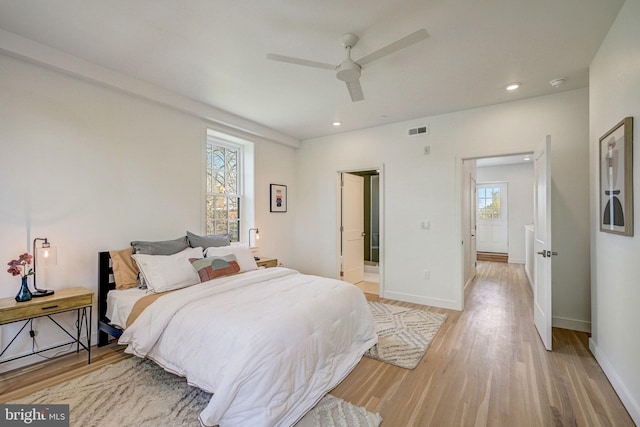 bedroom featuring ceiling fan and light wood-type flooring