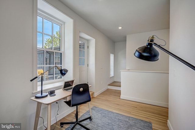 home office featuring light wood-type flooring