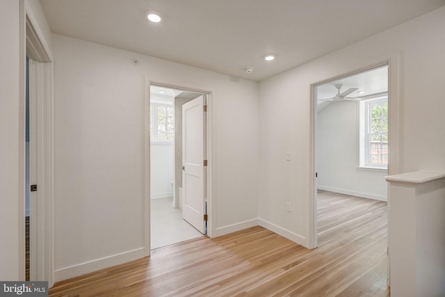 spare room with light hardwood / wood-style flooring