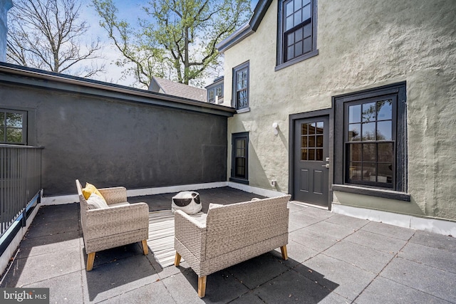 view of terrace with an outdoor living space