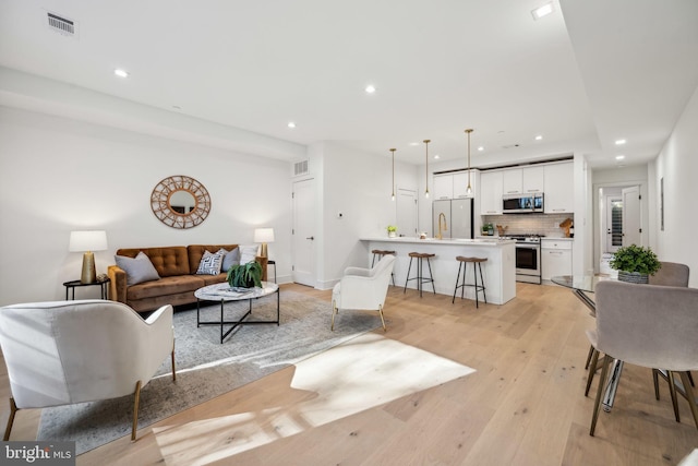 living room featuring light hardwood / wood-style flooring