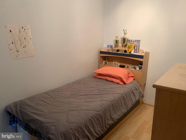 bedroom with light wood-type flooring