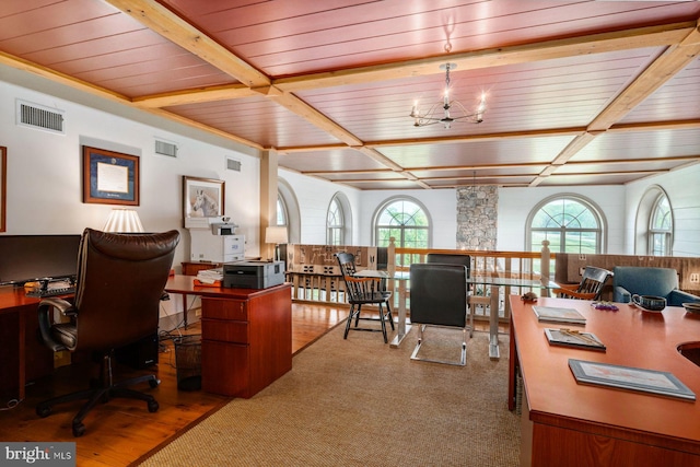 carpeted home office featuring wooden ceiling and an inviting chandelier