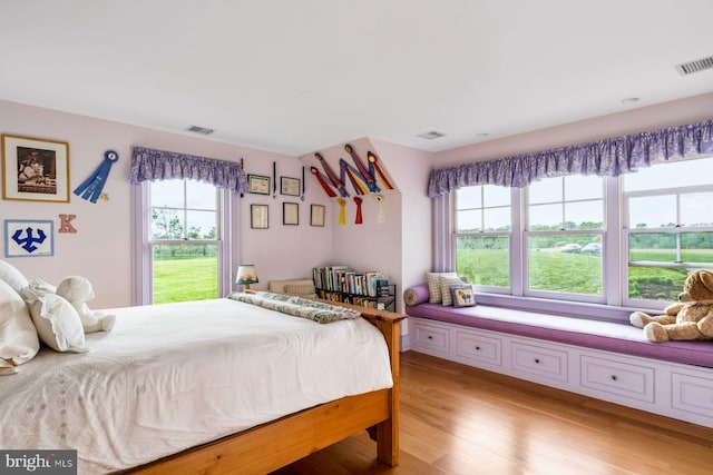 bedroom featuring light hardwood / wood-style flooring