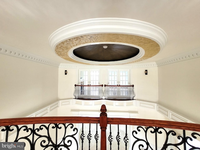 corridor featuring a tray ceiling