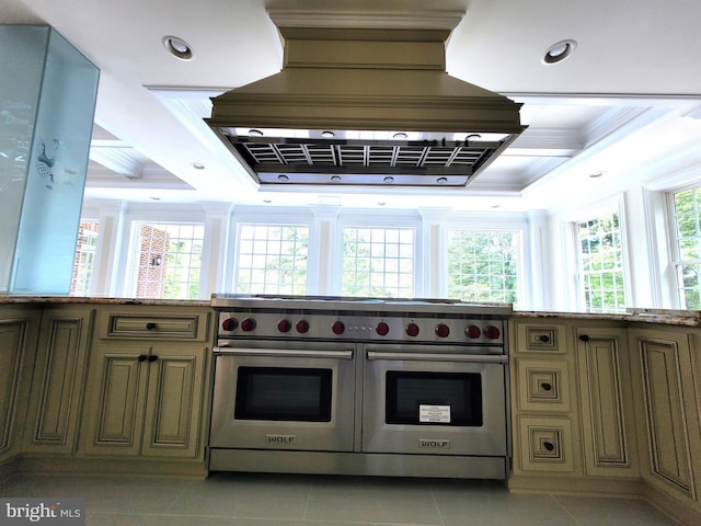 kitchen with custom range hood, light tile patterned floors, double oven range, and ornamental molding