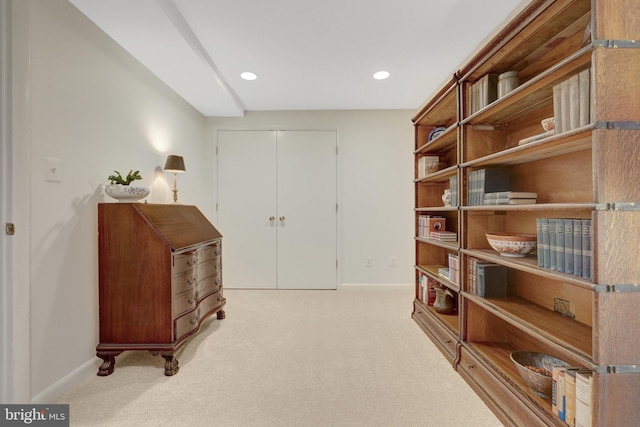 interior space with baseboards, carpet flooring, and recessed lighting