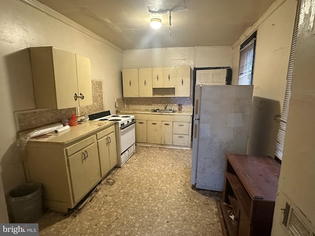 kitchen with white cabinets, white appliances, backsplash, ornamental molding, and sink