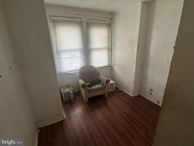 unfurnished room with dark hardwood / wood-style flooring