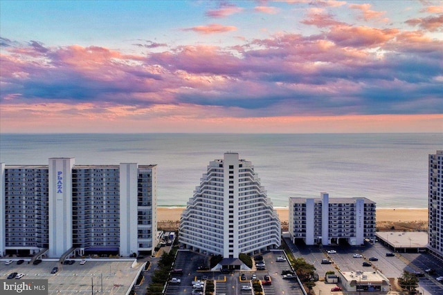 aerial view at dusk with a water view