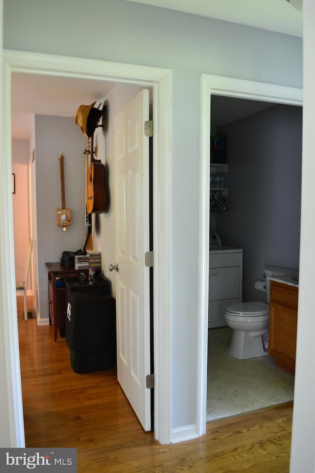 interior space featuring washer and clothes dryer and tile flooring