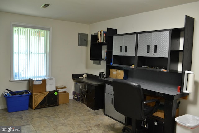 office featuring a wealth of natural light and tile flooring