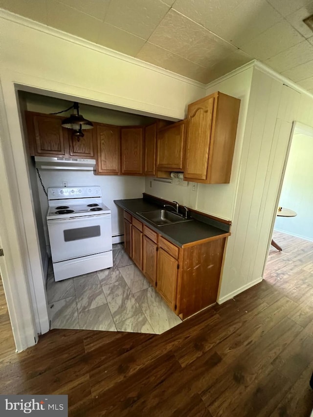 kitchen with a baseboard radiator, tile floors, ornamental molding, sink, and electric stove