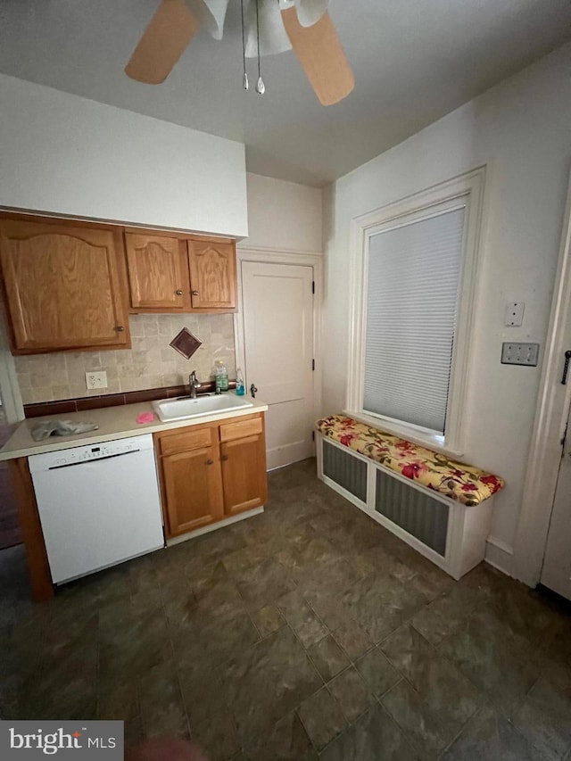 kitchen with ceiling fan, dark tile floors, and white dishwasher