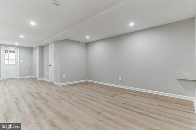 unfurnished living room featuring light hardwood / wood-style flooring