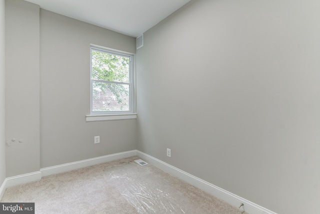 view of carpeted spare room