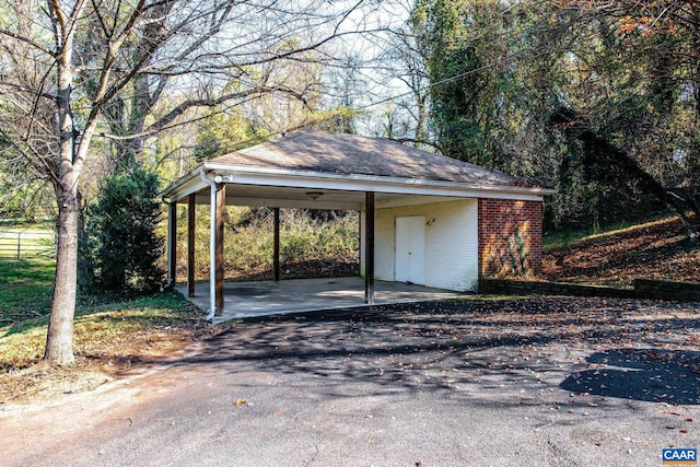 view of car parking featuring a carport