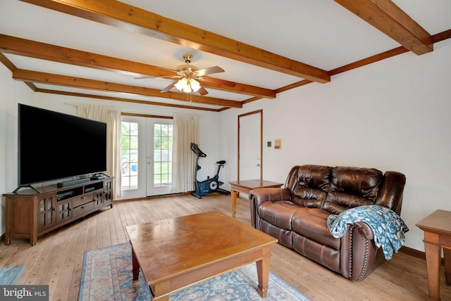 living room with beamed ceiling, light wood-type flooring, ceiling fan, and french doors