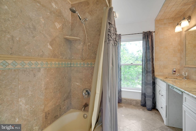 bathroom featuring shower / bath combo with shower curtain, vanity, tile patterned floors, and plenty of natural light