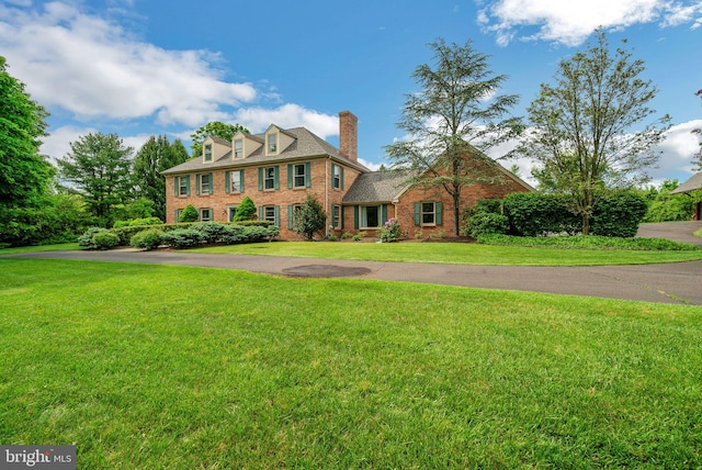 colonial house with a front lawn