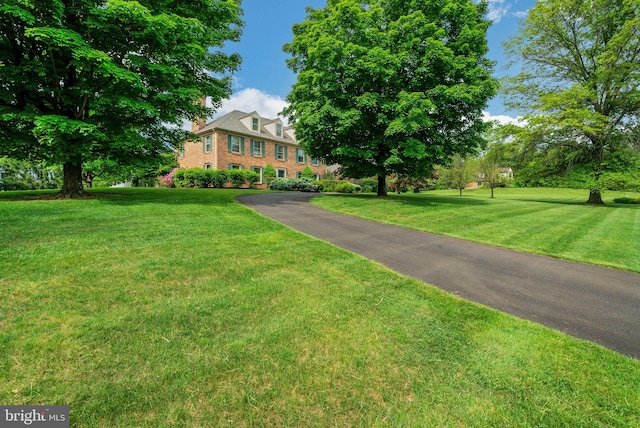 view of front of property with a front lawn