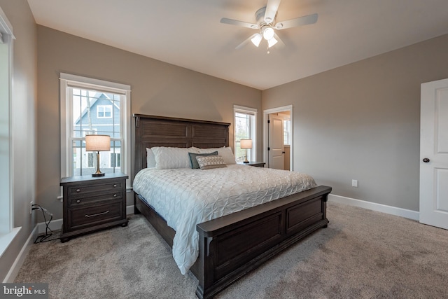 bedroom with light carpet and ceiling fan