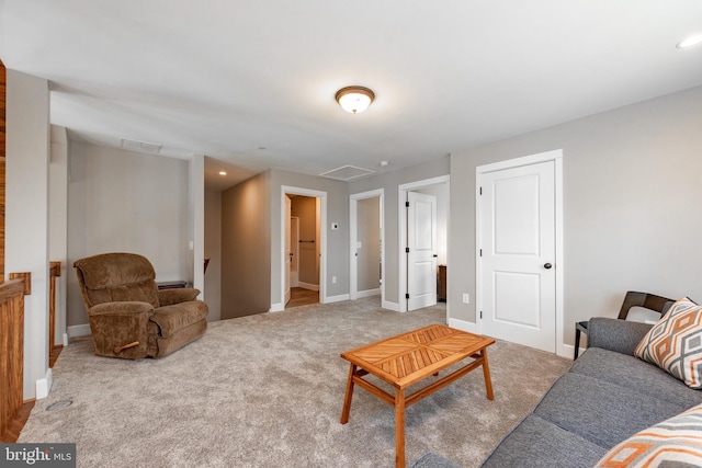 living room featuring carpet