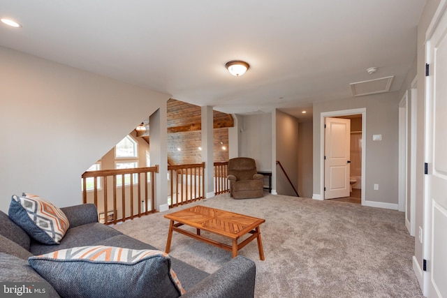 living room with carpet and lofted ceiling