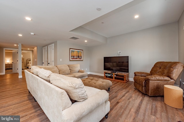 living room with hardwood / wood-style flooring