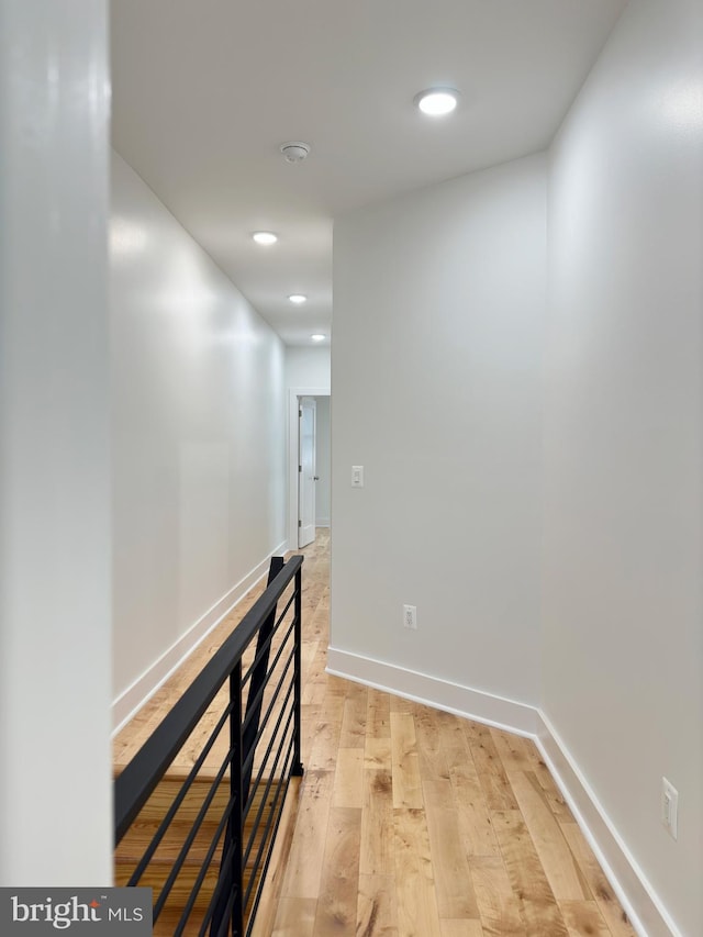 hall featuring light hardwood / wood-style floors