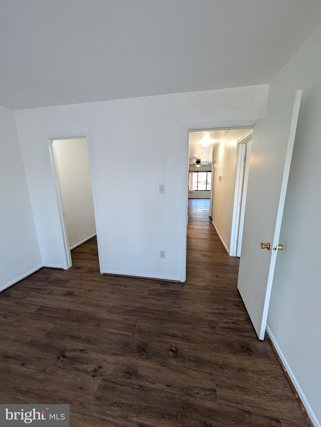 bathroom with  shower combination, hardwood / wood-style flooring, and toilet