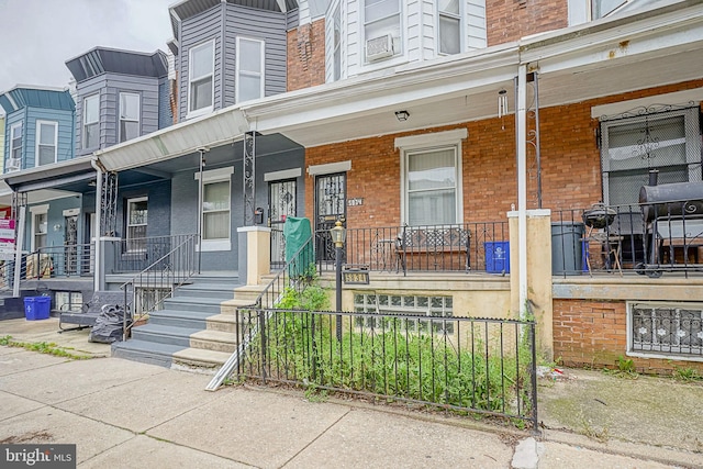 doorway to property with a porch