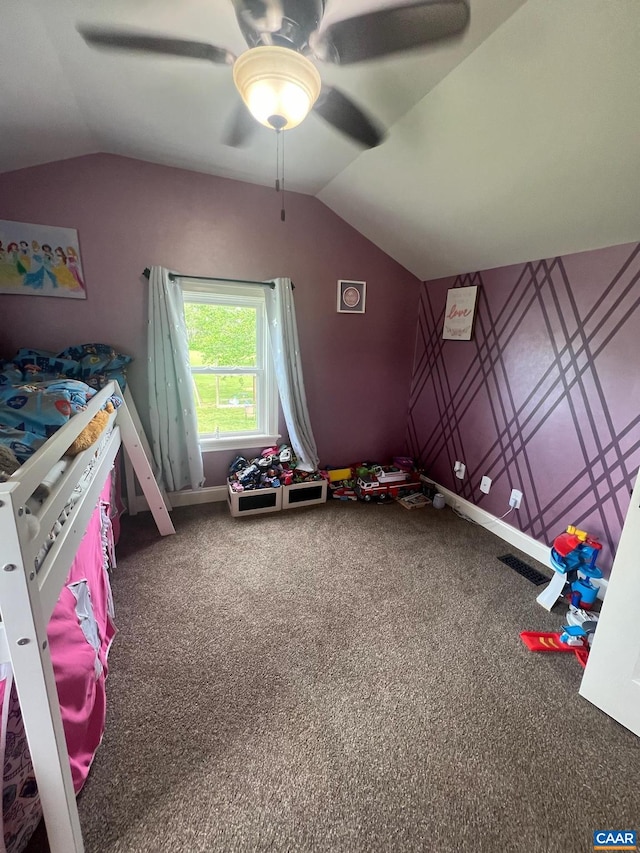 bedroom with carpet, ceiling fan, and vaulted ceiling