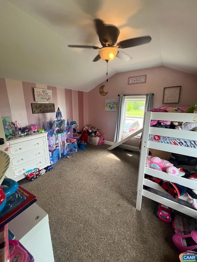 bedroom featuring ceiling fan, vaulted ceiling, and carpet flooring