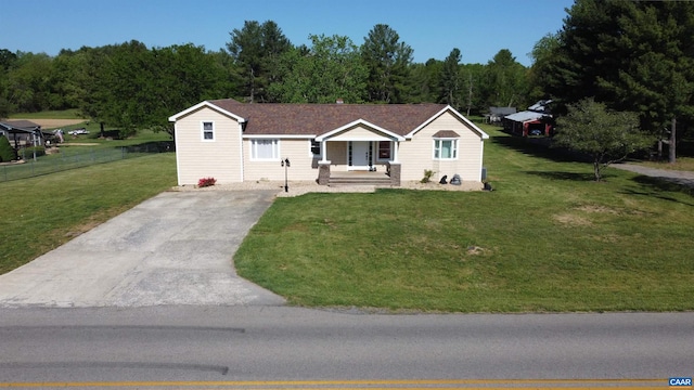 ranch-style home with a front lawn