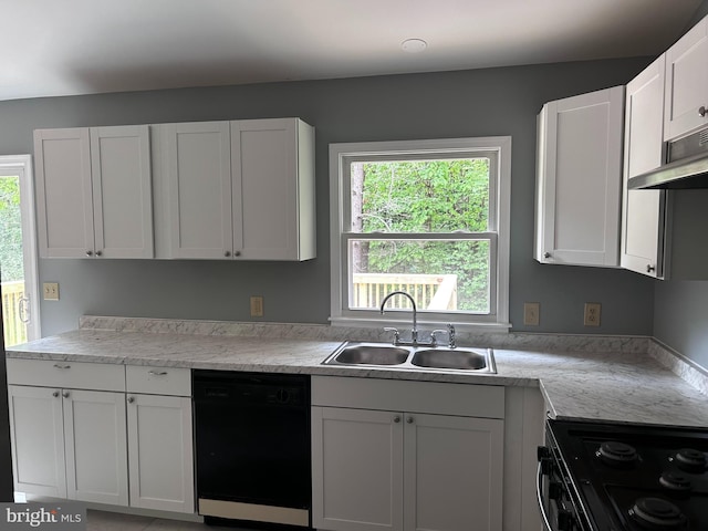 kitchen with white cabinets, sink, and black appliances