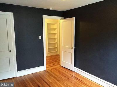 empty room featuring hardwood / wood-style floors