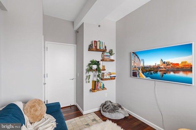 sitting room with hardwood / wood-style flooring