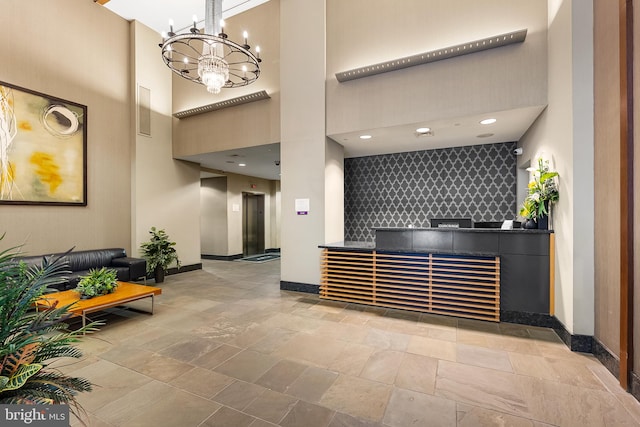 reception area with a notable chandelier