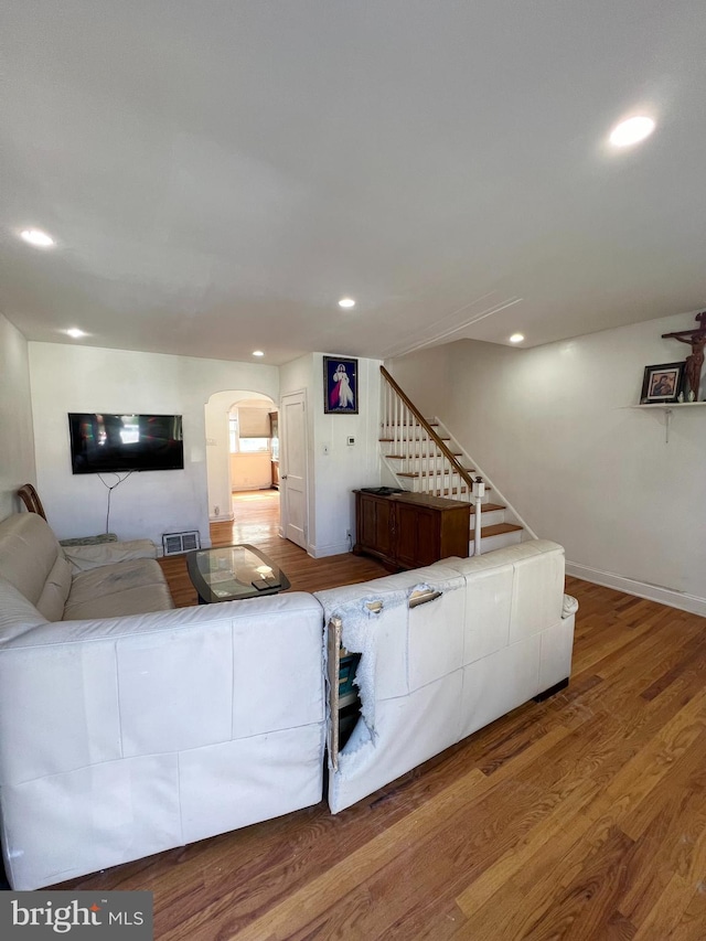 living room with wood-type flooring